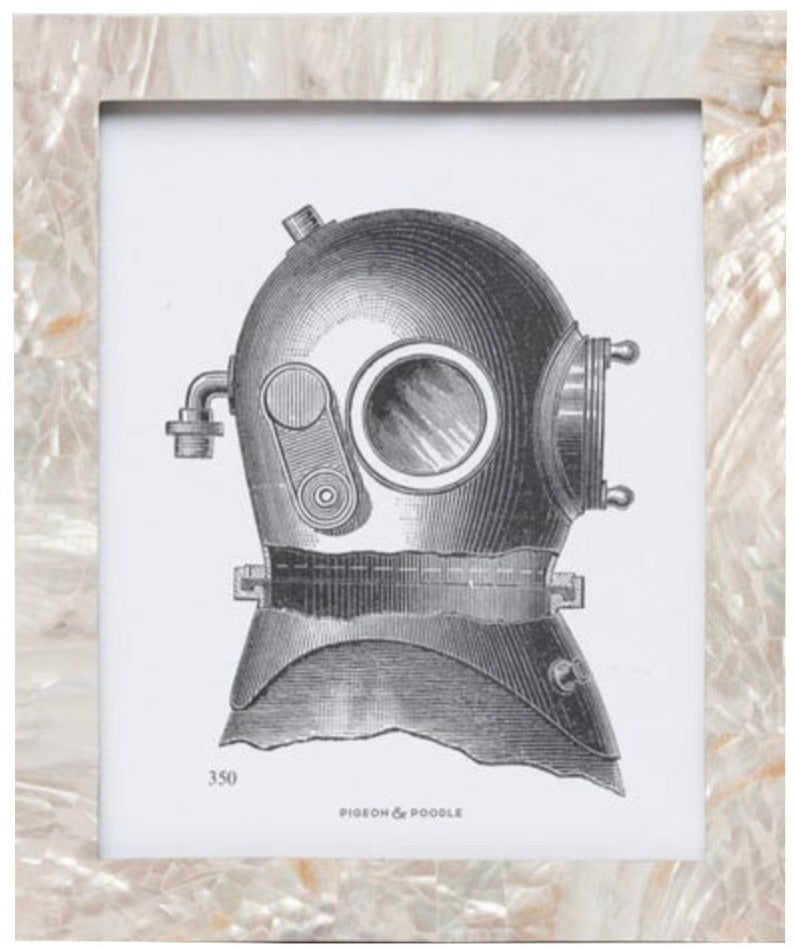 Black and white vintage diving helmet illustration centered on a white background, accented by the Aurora Frame Collection’s iridescent shell frame and textured pearlescent border from Pigeon & Poodle.