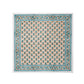 The Alwar Table Linen Collection by SLOANE BY HAND features square beige textiles with blue and green floral motifs and ornate borders—ideal as hand block printed floral tablecloths or decorative table linens.