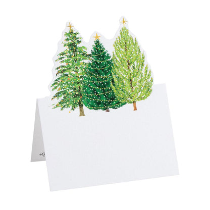 Caspari's Christmas Trees with Lights Collection card features three illustrated trees adorned with lights and stars, inspired by festive cocktail napkins and printed with nontoxic dyes. Blank inside for your message.