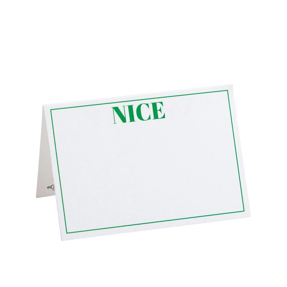 The Caspari Naughty or Nice Reversible Place Card Set includes a white, tent-style card with a green border and "NICE" in bold green at the top, made from quality cardstock. The remaining area is blank for your personalization.