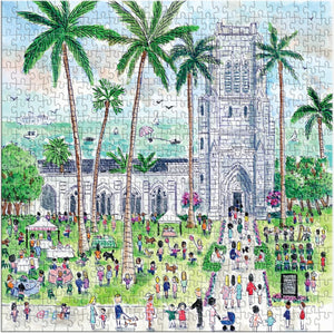The Michael Storrings Sunday Palm Beach 500 Piece Puzzle by Chronicle Books depicts a lively outdoor scene with people, tents, palm trees, and a grand stone church or cathedral in the background.