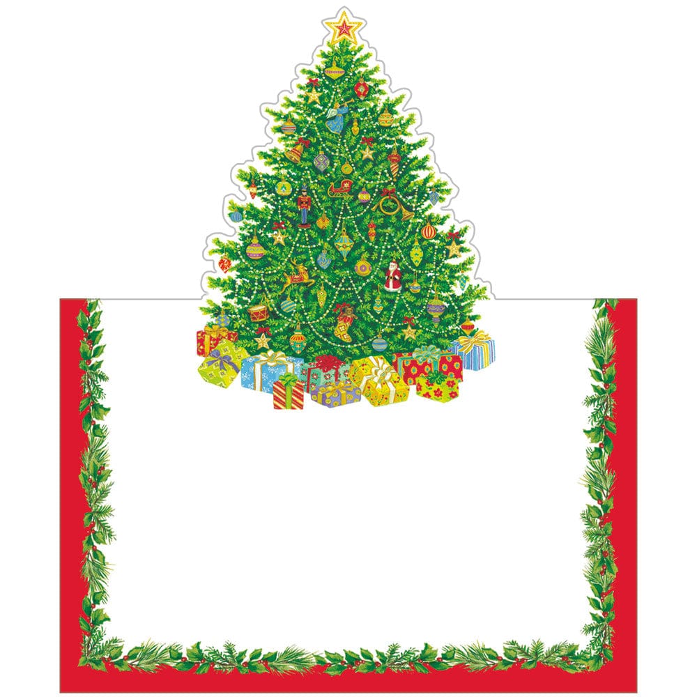 A decorated Christmas tree with gifts sits above a blank white space bordered by garland and red trim, showcasing the Caspari Christmas Tree Collection's exceptional design—perfect for festive gift supplies.