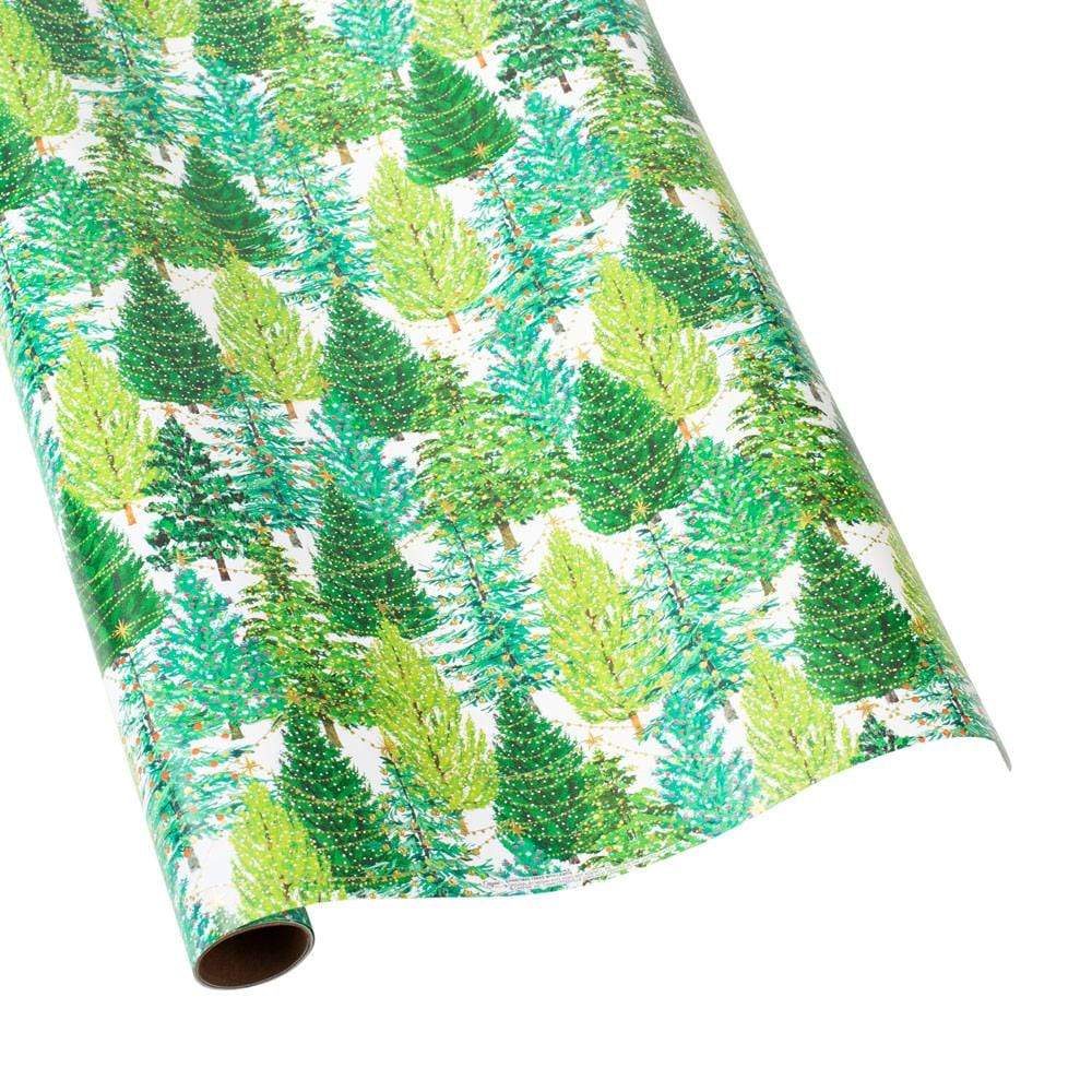 A roll of Caspari’s Christmas Trees with Lights Collection wrapping paper, featuring green and blue tree designs, coordinates perfectly with festive guest towel or triple-ply cocktail napkins.