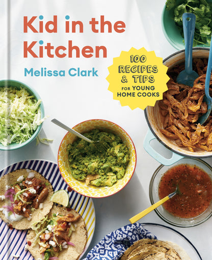 Cover of “Kid in the Kitchen” from Penguin Random House, highlighting tacos, guacamole, lettuce, shredded meat, salsa, and chopped herbs in bowls alongside a badge reading “100 Recipes & Tips for Young Home Cooks.” Explore easy and inspiring recipes designed especially for young chefs.