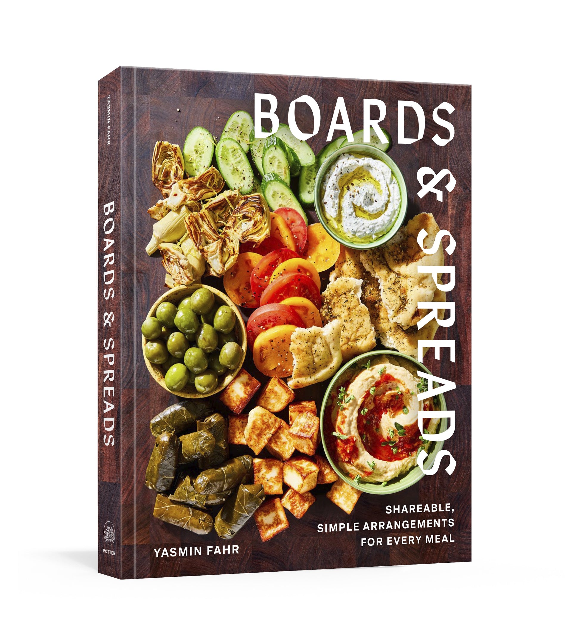 “Boards & Spreads” by Penguin Random House is a cookbook that showcases an array of vegetables, dips, and snacks artistically presented on a wooden board—an ideal source of inspiration for creating your own appetizer spreads and inventive recipe boards.