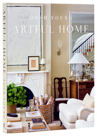 Artful Home" by Josh Young, published by Rizzoli, features a stylish living room with a white fireplace, striking artwork, and modern classic decor.