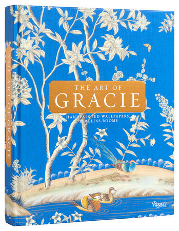 Cover of "The Art of Gracie: Handpainted Wallpapers, Timeless Rooms" by Rizzoli features a blue background adorned with white floral designs and a bird, highlighting the custom artwork beloved by interior designers.