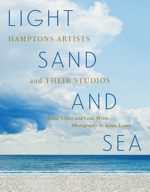 Light, Sand, and Sea" by Abrams is an elegant art coffee table book featuring blue and gold text on a beach photograph cover that celebrates the work of East End Long Island artists and their studios.