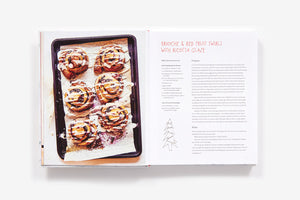 Open Home Made Christmas cookbook showing a recipe for brioche and red fruit swirls with ricotta glaze, featuring a photo of five baked rolls on a tray.