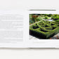 An open book, Bunny Williams: On Garden Style by Abrams, displays text on the left and a photo on the right—a square hedge maze with lush gardens and a cobblestone path, reflecting Bunny Williams' signature outdoor room concept.