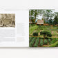 An open book, Bunny Williams: On Garden Style by Abrams, displays an old illustration on the left and a photo of a well-designed vegetable garden inspired by Bunny Williams on the right.