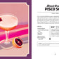 A cocktail glass with a pale drink, garnished with a blood orange wheel, sits beside a halved blood orange on a pink and purple background—perfect for anyone drawing inspiration from World Cocktail Adventures by Chronicle Books.