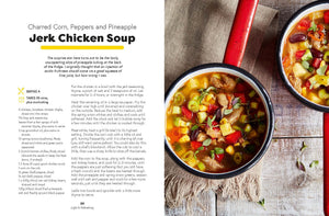 A saucepan filled with vibrant jerk chicken soup—a nourishing recipe from *Seriously Good Soups* by Chronicle Books—sits on a rustic table beside a cloth napkin, with the recipe text displayed on the left.