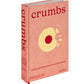 Crumbs: Cookies and Sweets from Around the World," by Ben Mims, features a red cover with a partially eaten cookie and explores global cookie and sweet recipes. Published by Phaidon, it promises to sweeten any kitchen with its delightful international treats.