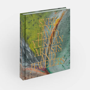 The book "Sybil and David Yurman: Artists and Jewelers" by Phaidon, featuring a green and multicolored abstract cover with gold text, offers a vivid journey into jewelry design.