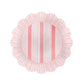 The Cabana Stripe Melamine Dinnerware Collection by Juliska features a round shatterproof dinner plate with a ruffle trim, vertical pink and white stripes, and a fine lined border for stylish, durable dining.