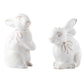From the Juliska Whitewash Bunny Serveware Collection, two white ceramic rabbit salt and pepper shakers with embossed bows are shown facing each other against a plain white background.