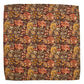 Introducing the Willa Amber Napkin Set by Juliska—a square fabric adorned with a dense floral motif in autumnal hues of brown, orange, yellow, and green. This exquisite heirloom textile is perfect for creating elegant linen napkins.