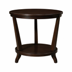 The Rye Round Table in Java by Hickory Chair features a rich, dark brown finish, distinctive angled legs, and a practical lower shelf. Displayed against a white background, this modern piece exemplifies architectural design furniture at its best.