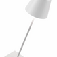 The Zafferano America Poldina Pro Lamp Collection features a modern white desk lamp with a conical shade, slender stem, square base, and visible power cord—ideal for those switching to portable lamps for extra convenience.