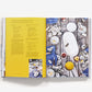 The Saltwater Table: Recipes From The Coastal South by Abrams opens to a yellow page of local ingredient recipes, paired with an overhead oyster roast table setting photo.