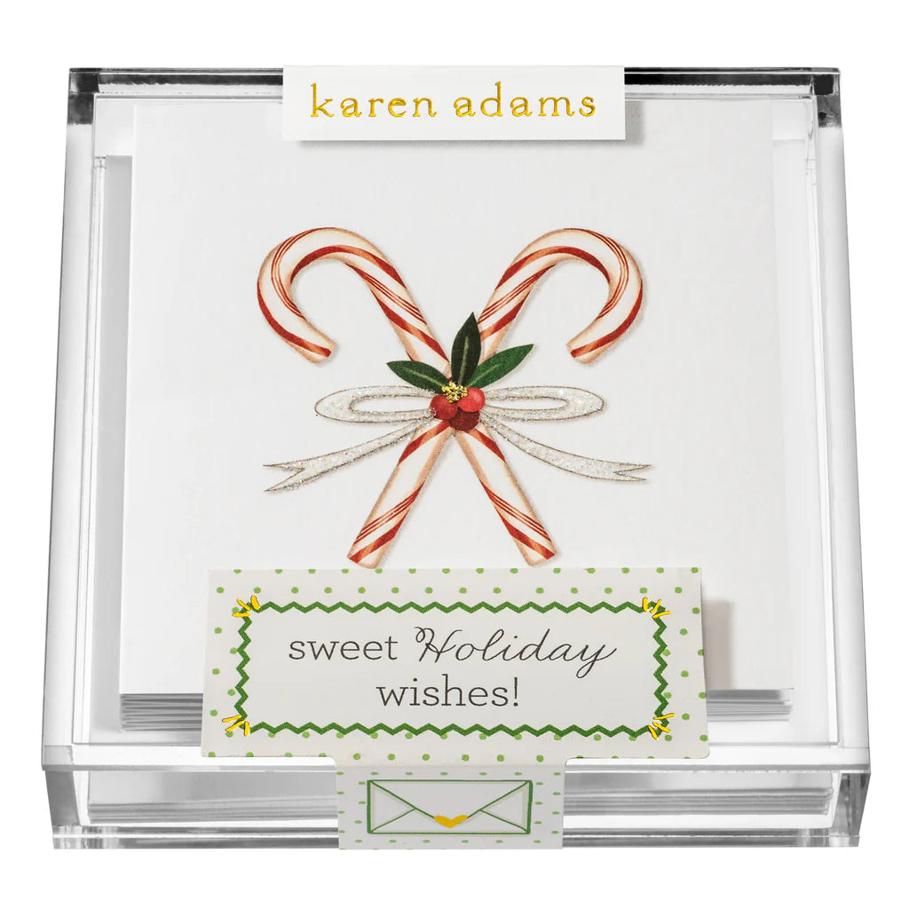 Karen Adams Holiday Acrylic Gift Enclosures feature hand-glittered cards with crossed candy canes, a festive bow, and holly, marked "sweet holiday wishes!"—a sparkling touch for any holiday gift.