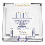Karen Adams Holiday Acrylic Gift Enclosures feature Hanukkah-themed, hand-glittered cards with a blue menorah and "Happy Hanukkah!"—perfect for holiday gifts or as festive enclosure cards.