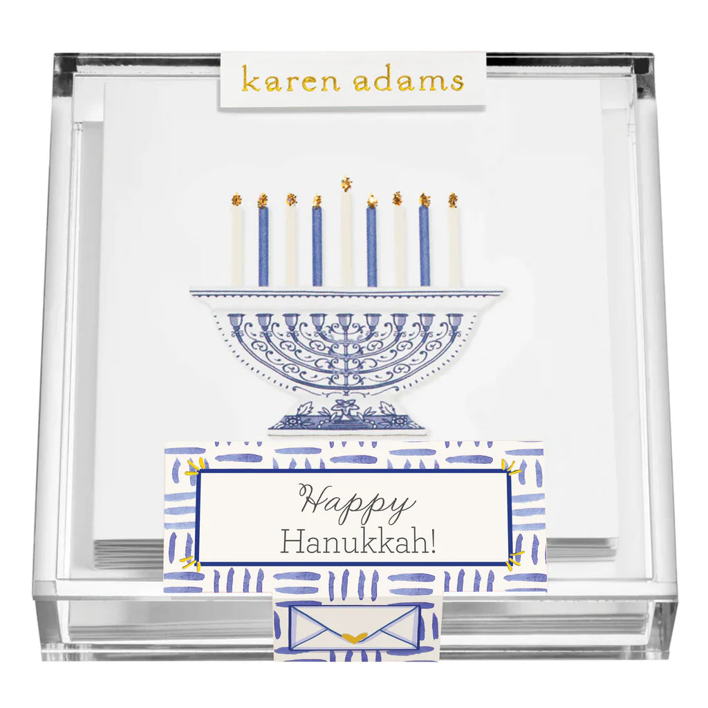 Karen Adams Holiday Acrylic Gift Enclosures feature Hanukkah-themed, hand-glittered cards with a blue menorah and "Happy Hanukkah!"—perfect for holiday gifts or as festive enclosure cards.