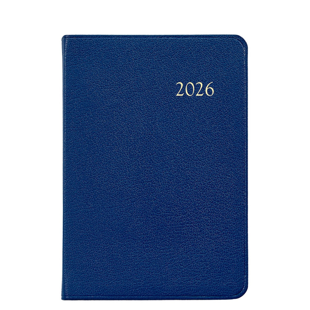 A blue leather-bound 2026 Daily Journal Planner from Graphic Image, featuring "2026" embossed in gold on the cover, shown against a white background.