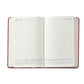 The 2026 Daily Journal Planner Collection by Graphic Image features a day-at-a-view layout with lined sections for appointments and notes, dated pages for July 15 and 16, plus a small yearly calendar at the bottom.