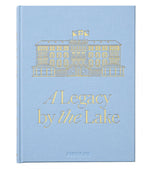 Featuring a light blue cover with a gold illustration of a building, Baur Au Lac: A Legacy by the Lake by Assouline celebrates the storied history of Zurich’s renowned luxury hotel, Baur au Lac.