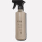 Beige L’Avant Collective Ambre Santal multipurpose cleaner spray bottle with a black trigger nozzle.