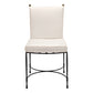 The Amalfi Dining Side Chair in Slate by Janus et Cie features a white cushion, black metal frame, and curved stretcher at the base, inspired by sleek Amalfi outdoor furniture design and viewed from the front.