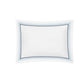 Rectangular white pillowcase from the Matouk Amara Triple Pearl Bedding Collection, featuring an elegant triple pearl embroidery in blue and gray on luxurious Amara sateen, viewed from above on a plain white background.