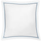 The Amara Triple Pearl Bedding Collection by Matouk features a white square pillow, crafted from luxurious Amara sateen, and adorned with an elegant double border embroidery in navy blue and light blue near the edges. Shown on a plain white background.
