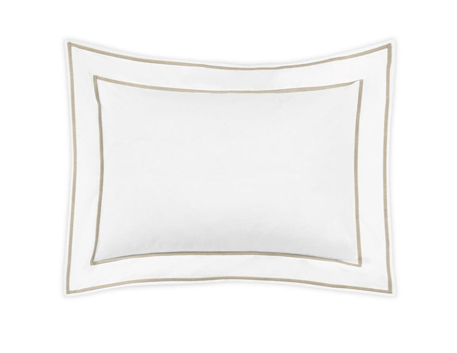 The Ansonia Bedding Collection pillow by Matouk features a white Egyptian cotton percale cover with a double beige border—an elegant almond-accented addition to luxury bedding.