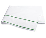 A folded sheet from the Ansonia Bedding Collection by Matouk, crafted from smooth cotton percale and featuring two parallel green stripes near the edge, is displayed on a plain white background.
