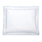 The Ansonia Bedding Collection pillowcase from Matouk features a crisp white cotton percale with an elegant blue border and delicate satin stitching, shown here laid flat against a white background—an ideal choice for enhancing your luxury bedding ensemble.