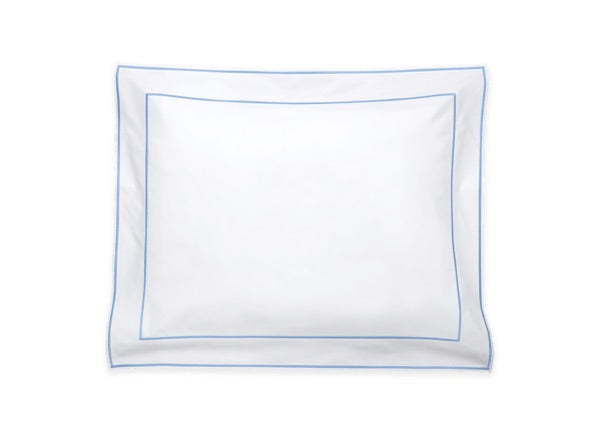 The Ansonia Bedding Collection pillowcase from Matouk features a crisp white cotton percale with an elegant blue border and delicate satin stitching, shown here laid flat against a white background—an ideal choice for enhancing your luxury bedding ensemble.