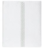 Introducing the Astor Braid Matelassé Bedding Collection by Matouk—a white quilted blanket adorned with a diamond pattern inspired by the Petra diamond matelassé. This refined piece features the signature Astor Braid embroidery as a vertical decorative looped trim down the center, exemplifying elegant craftsmanship from Matouk.