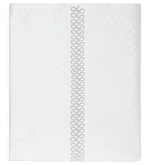 The Astor Braid Matelassé Bedding Collection in silver by Matouk features a diamond-patterned quilt with a single decorative stitched strip running vertically down the center.