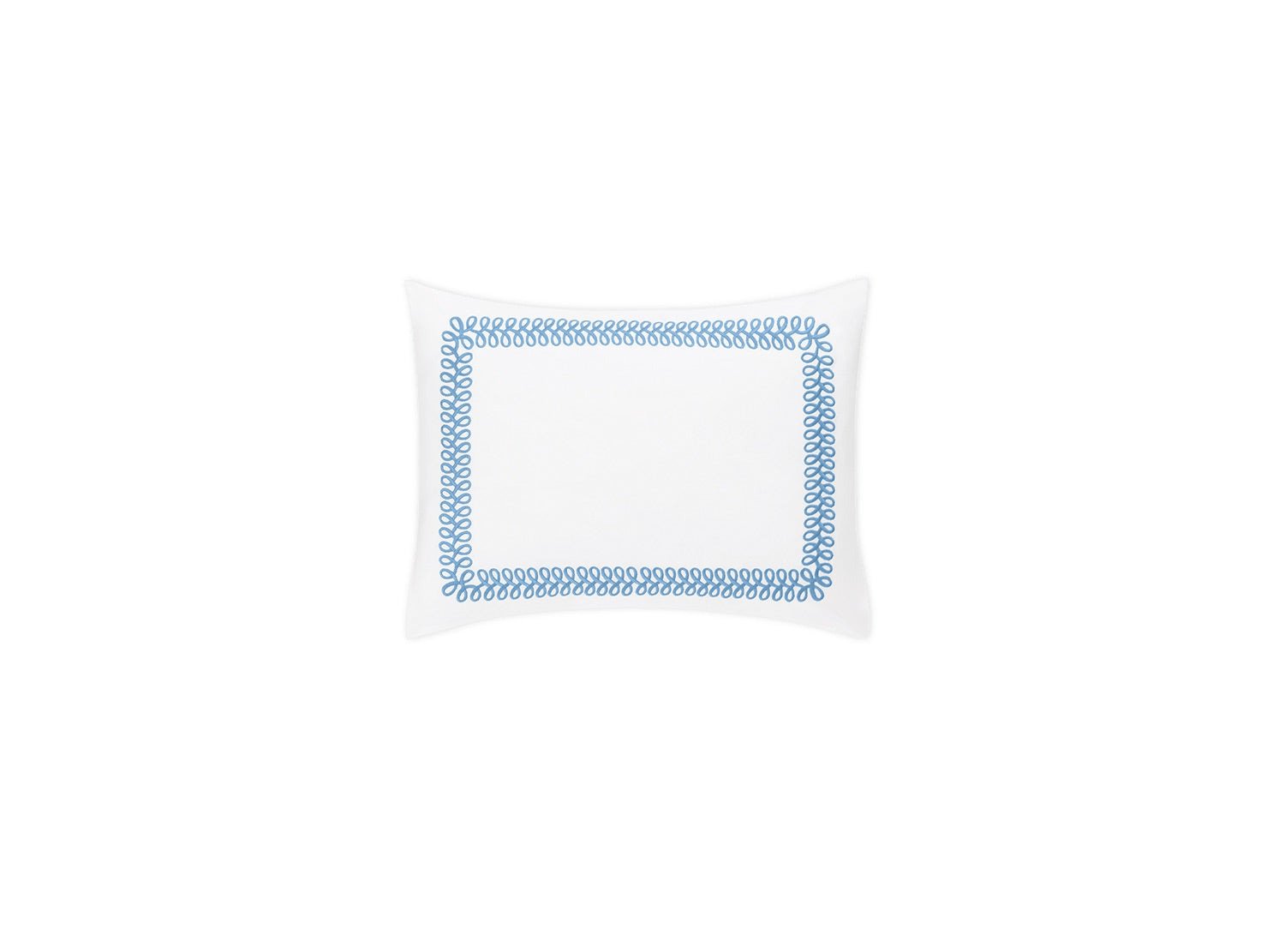 A white rectangular pillowcase from Matouk’s Astor Braid Bedding Collection, Sky, features a blue embroidered looped border and is crafted in luxurious Ceylon percale.