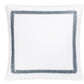 The Astor Braid Bedding Collection pillow by Matouk is a white Ceylon percale square with an indigo embroidered looped border design.