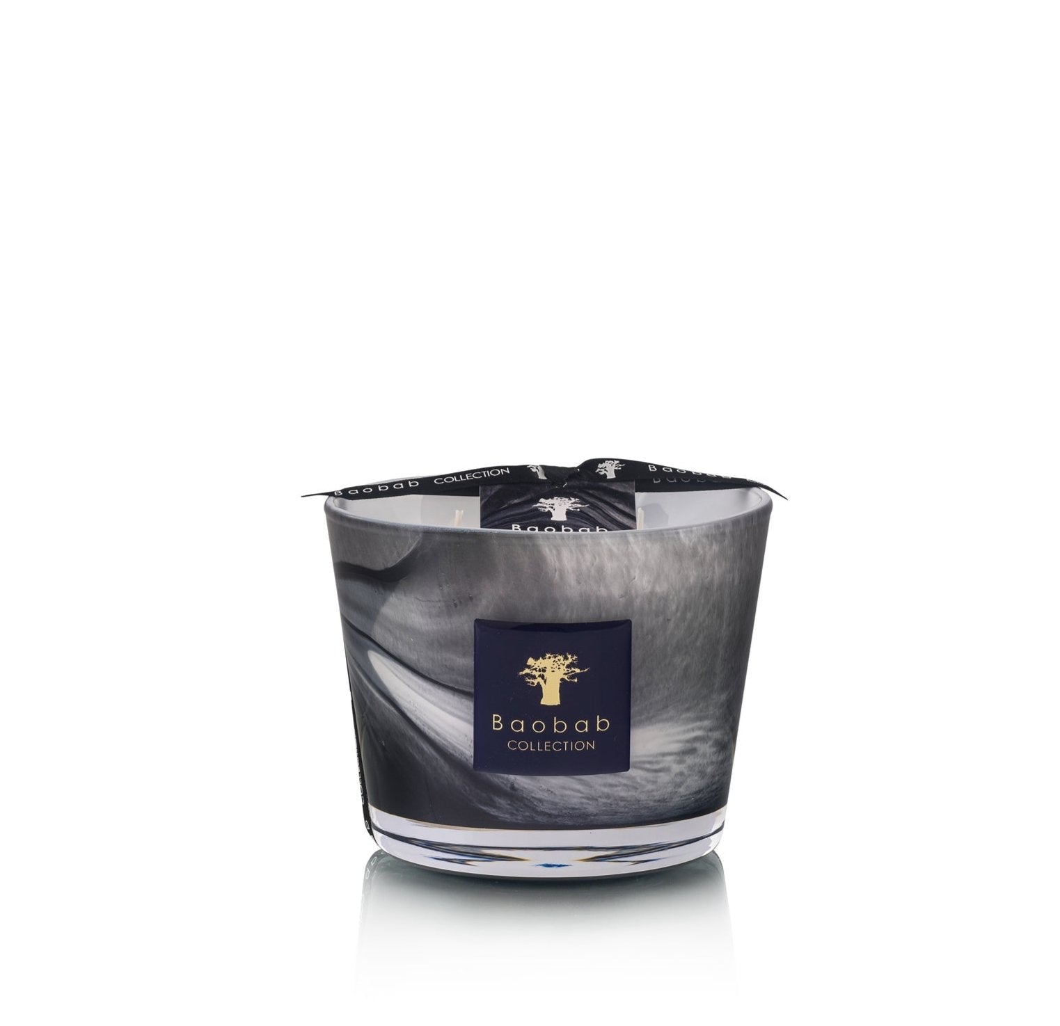 The Baobab Collection Atlas Toubkal Candle by Baobab is housed in a glass holder adorned with a black, white, and gray design featuring a tree logo on the label, and it releases enchanting notes of rose and Atlas cedar.