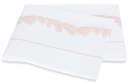White Matouk Atoll Bedding Collection bed sheet with pink Ceylon cotton percale embroidery designs.