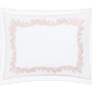 The Matouk Atoll Bedding Collection in Blush features a white rectangular pillowcase with a light pink feathery coral botanical border, crafted from soft Ceylon cotton percale.