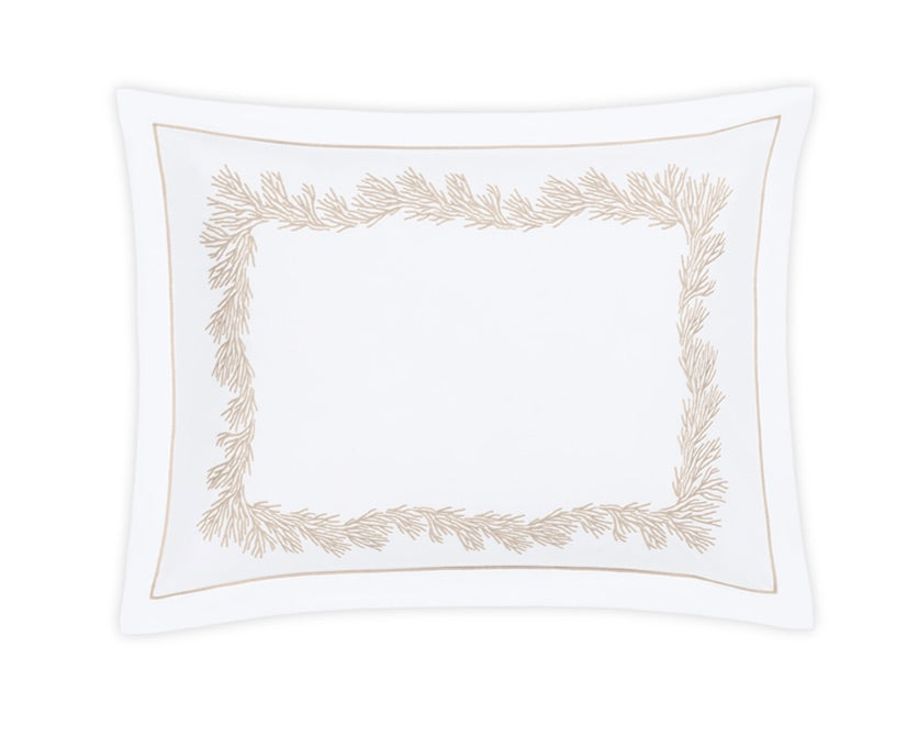 Experience the Atoll Bedding Collection by Matouk—this white pillowcase features a rectangular beige botanical embroidery and a refined beige outline, crafted from luxurious 520 thread count CEYLON cotton percale, shown on a white background.