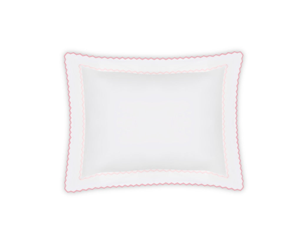 Part of the Axel Bedding Collection by Matouk, this white rectangular pillow features a scalloped edge with a pink border and delicate zigzag embroidery, shown against a white background.