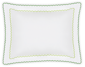 The Axel Boudoir Sham by Matouk is a rectangular white pillow with scalloped edges and green and yellow zigzag embroidery, expertly crafted from luxurious long-staple cotton for a modern touch to your bed.