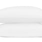 Two white pillows from the Axel Bedding Collection by Matouk, each crafted from soft long-staple cotton and featuring light blue and dark blue wavy lines embroidered in a zigzag pattern on one end, are stacked against a white background.